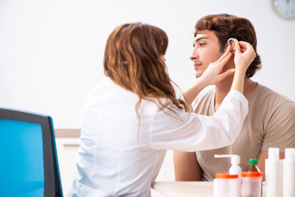 Patient with hearing problem visiting doctor otorhinolaryngologi